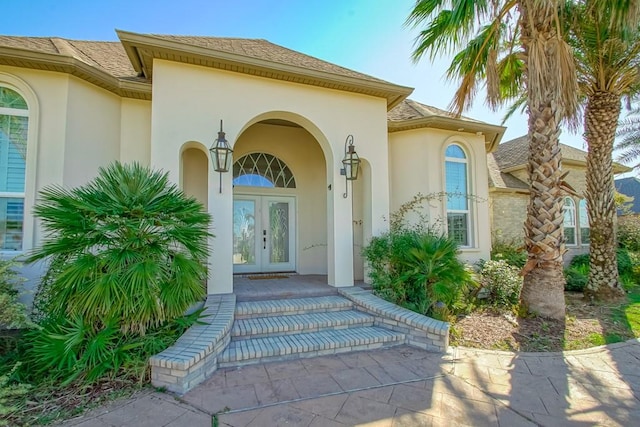 property entrance featuring french doors