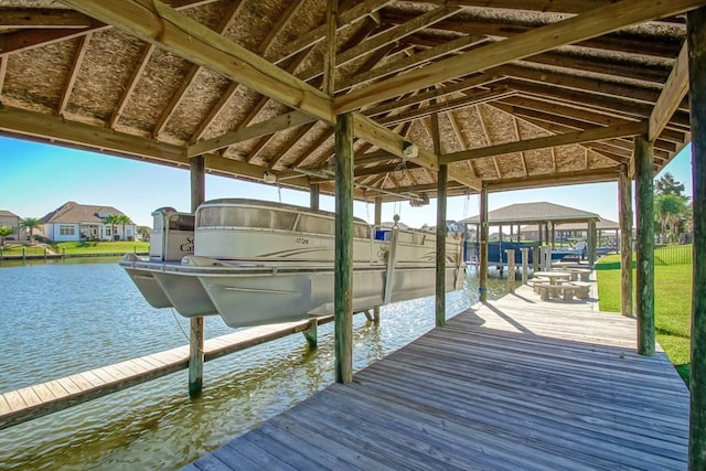 dock area with a water view