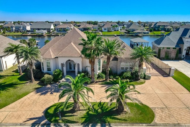 birds eye view of property featuring a water view