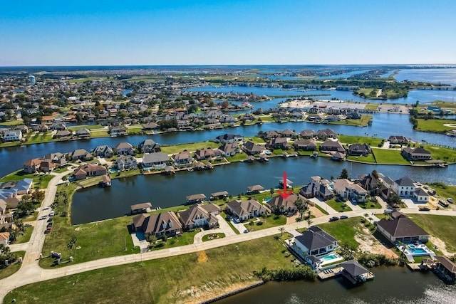 drone / aerial view with a water view