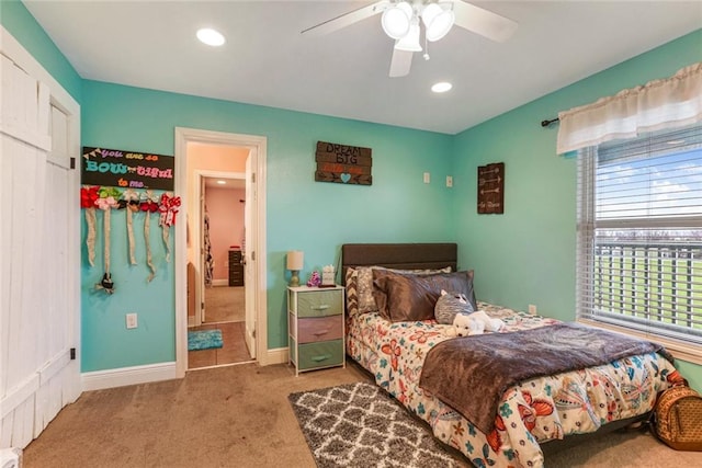 carpeted bedroom with ceiling fan