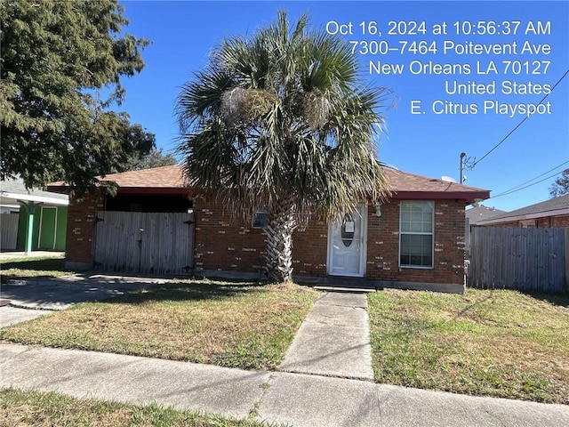 view of front of home with a front yard