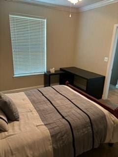 bedroom with ornamental molding