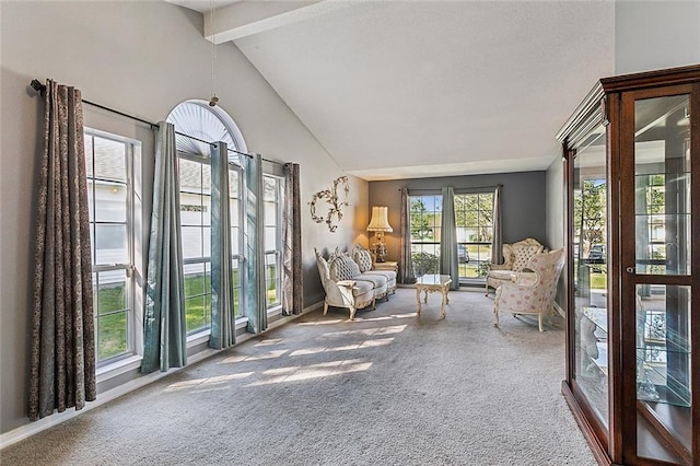 unfurnished sunroom with lofted ceiling with beams