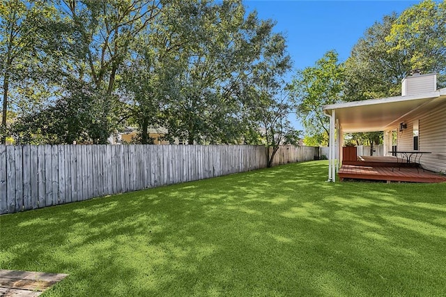 view of yard featuring a deck