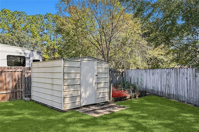 view of outdoor structure with a lawn