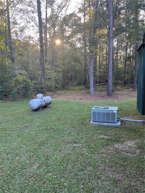 view of yard featuring central AC