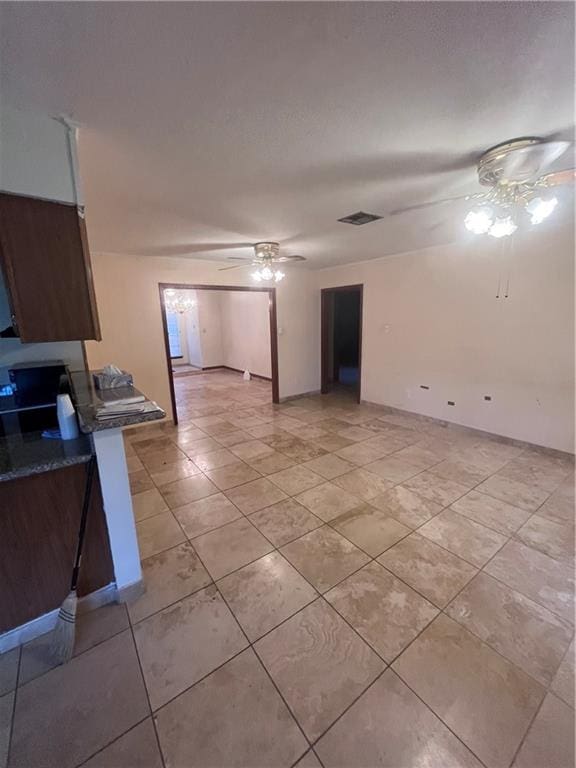 spare room featuring ceiling fan