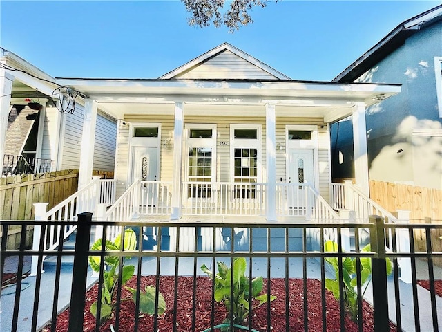 view of swimming pool featuring covered porch