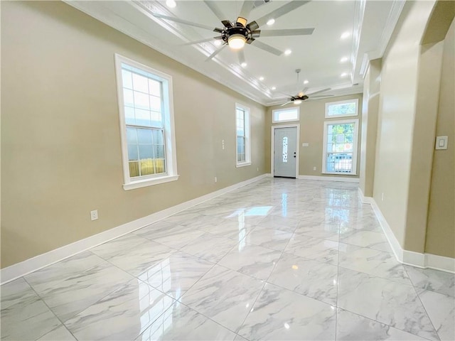 entryway featuring ceiling fan and ornamental molding