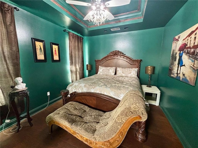 246 Cypress St, Independence, LA 70443 - bedroom with a ceiling fan, baseboards, visible vents, and a raised ceiling