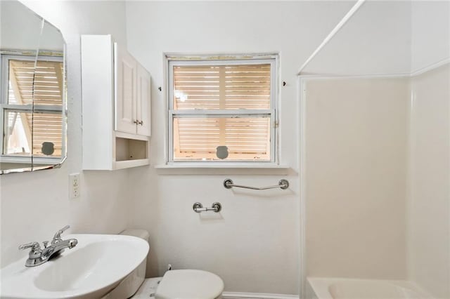 full bathroom featuring toilet, shower / bath combination, and sink