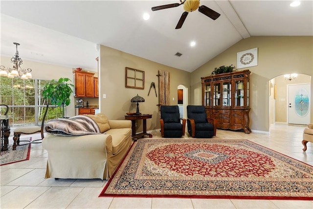 living room featuring light tile patterned floors, ceiling fan with notable chandelier, and lofted ceiling