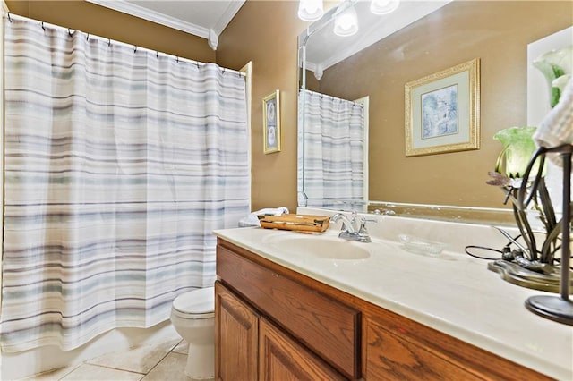 bathroom featuring tile patterned flooring, vanity, toilet, and ornamental molding