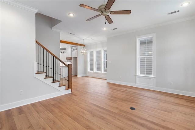 unfurnished living room featuring light hardwood / wood-style flooring, ornamental molding, and ceiling fan