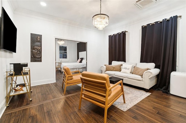 living room featuring a notable chandelier, ornamental molding, and dark hardwood / wood-style flooring