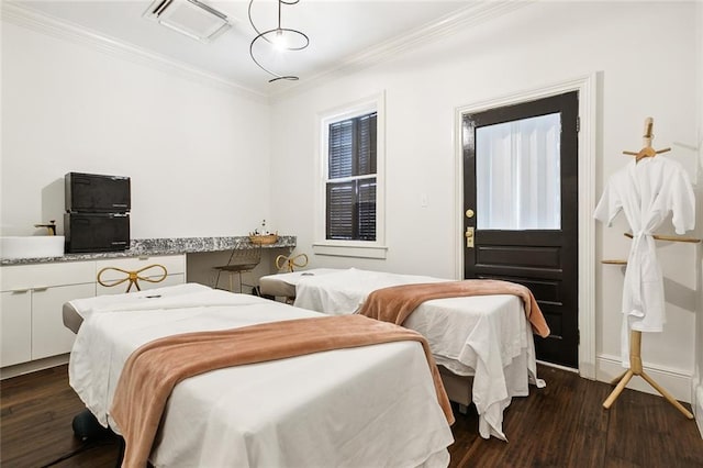 1900 N Rampart St, New Orleans, LA 70116 - bedroom featuring crown molding, dark wood-type flooring, and refrigerator