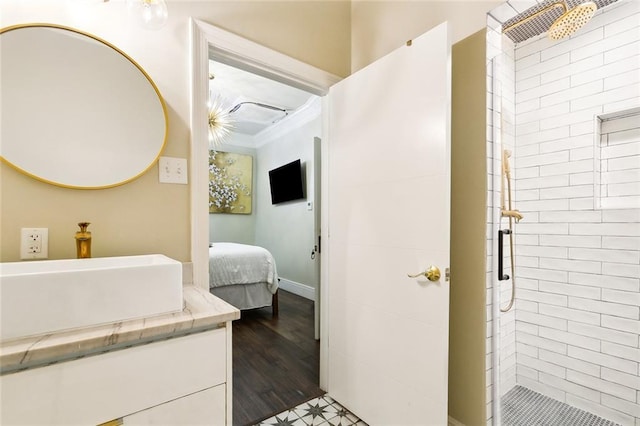1900 N Rampart St, New Orleans, LA 70116 - full bathroom with a shower stall, vanity, connected bathroom, ornamental molding, and wood finished floors