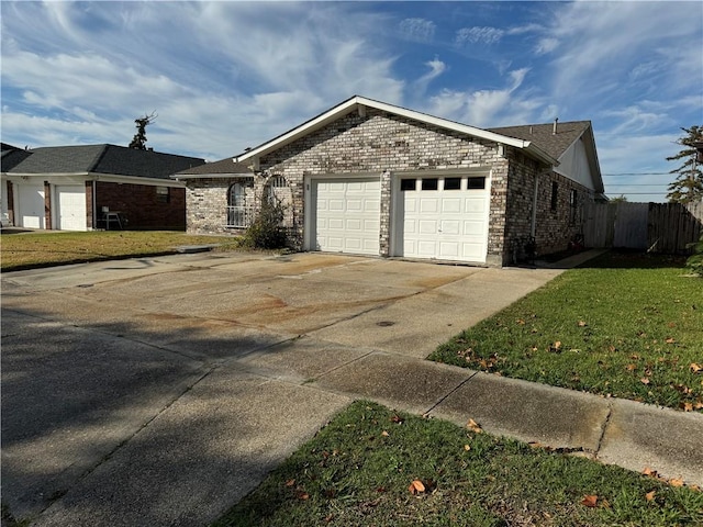 view of home's exterior with a yard and a garage