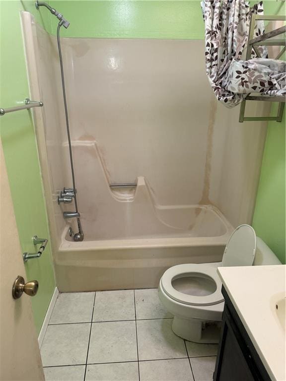 full bathroom with vanity, toilet, tile patterned flooring, and tub / shower combination