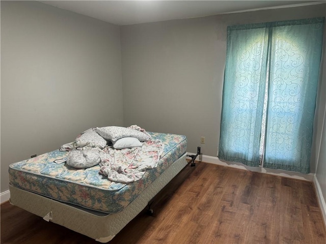 bedroom featuring hardwood / wood-style flooring