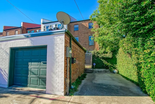 view of home's exterior with a garage