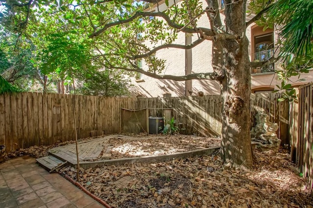 exterior space featuring a patio area and central AC