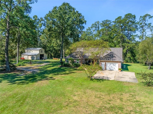 view of yard with a garage