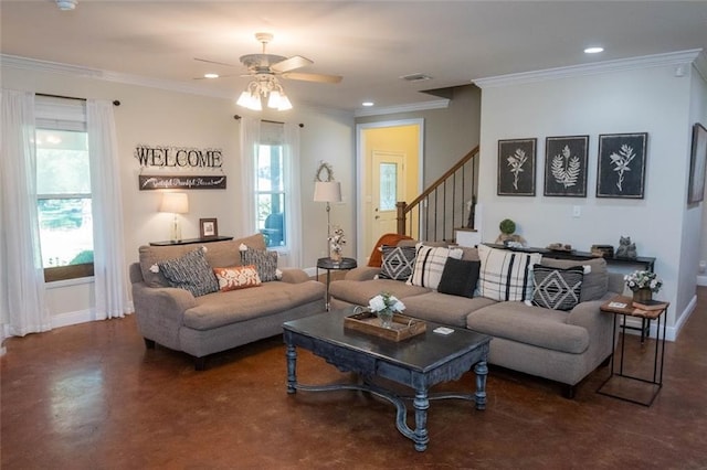 living room featuring ceiling fan and crown molding