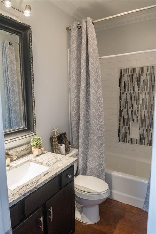 full bathroom with vanity, shower / bath combination with curtain, and toilet