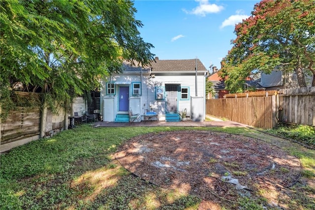 back of house featuring a patio area