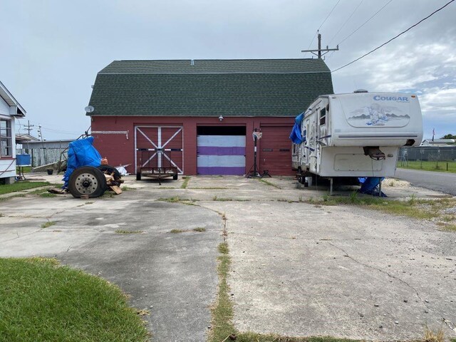 view of outdoor structure featuring a garage