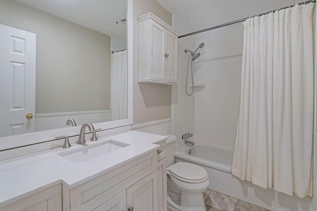 full bathroom featuring shower / bath combination with curtain, toilet, tile patterned floors, and vanity