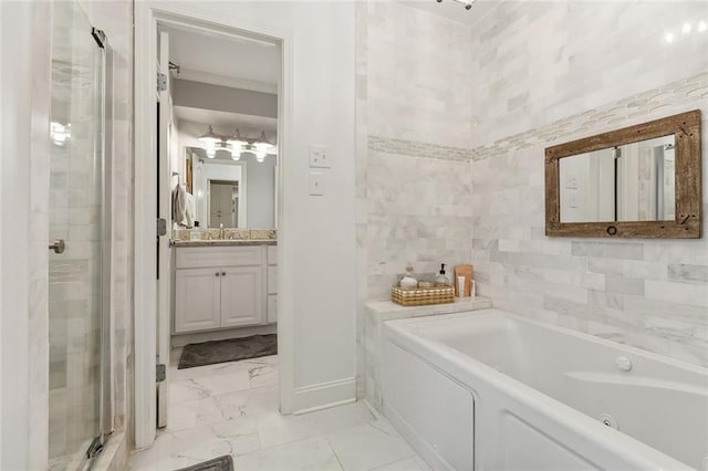 bathroom with vanity and independent shower and bath