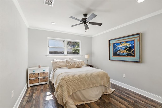 bedroom with crown molding, dark hardwood / wood-style floors, and ceiling fan