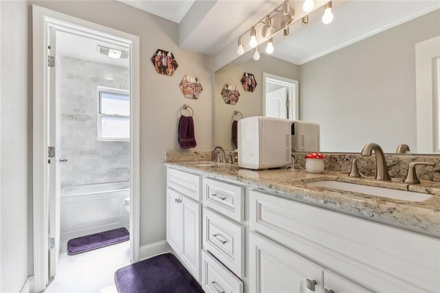 bathroom featuring vanity, ornamental molding, and toilet