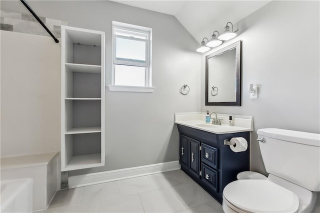 full bathroom featuring vanity, toilet, tile patterned floors, and vaulted ceiling