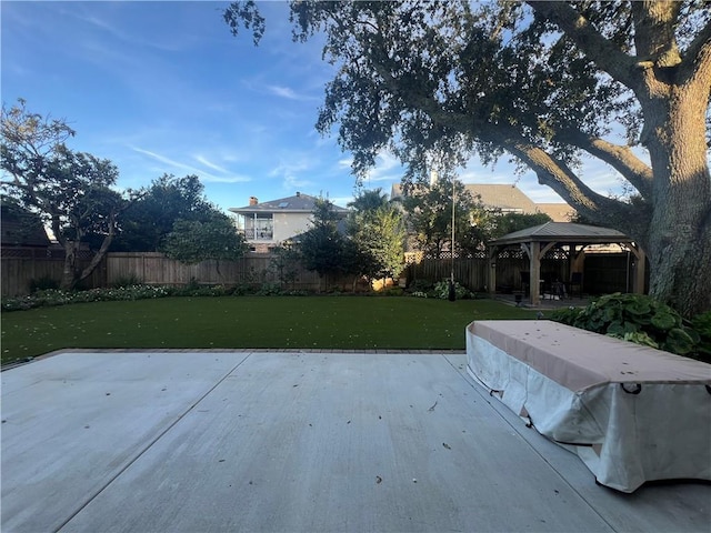 view of yard featuring a patio and a gazebo