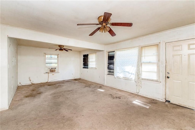 foyer entrance featuring ceiling fan