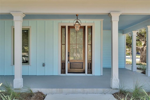 property entrance featuring covered porch