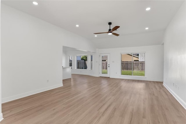 unfurnished living room featuring light wood-type flooring and ceiling fan