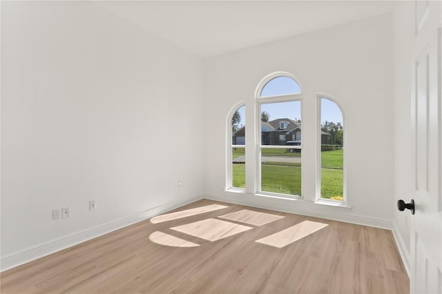 empty room with light wood-type flooring