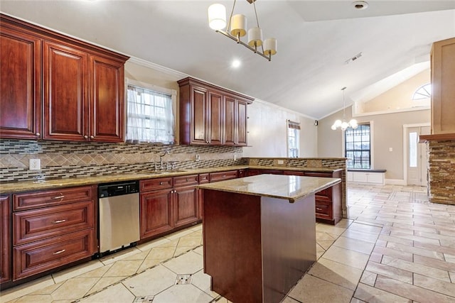 kitchen featuring stainless steel dishwasher, decorative light fixtures, lofted ceiling, and a wealth of natural light