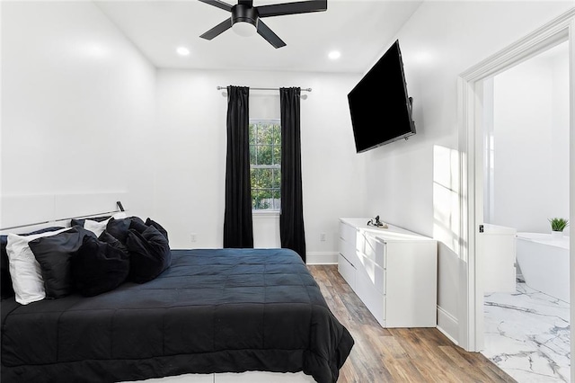 bedroom featuring light hardwood / wood-style flooring and ceiling fan