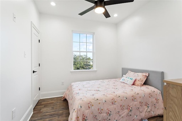 bedroom featuring dark wood-type flooring and ceiling fan