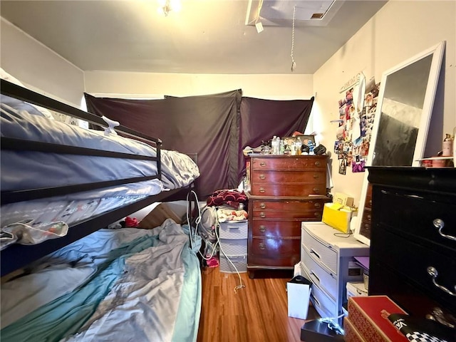 bedroom featuring dark hardwood / wood-style floors