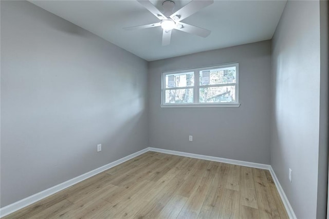 empty room with light hardwood / wood-style floors and ceiling fan