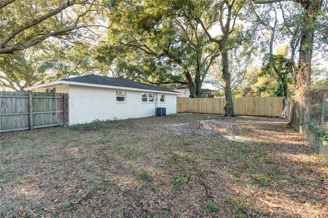 297 Nassau Dr, Slidell, LA 70458 - view of yard featuring a fenced backyard and cooling unit