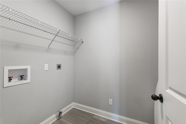 laundry room featuring electric dryer hookup and washer hookup