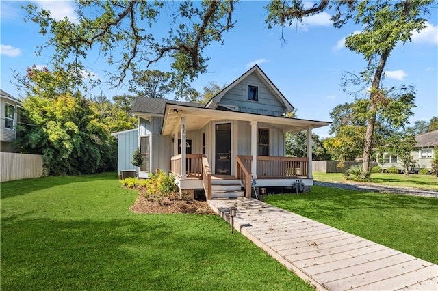 bungalow-style home featuring a front yard and a porch